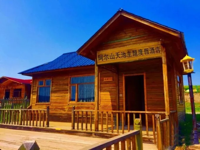 Wood-toned hotel buildings near Tianchi in Arxan