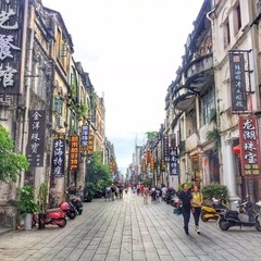 Abendpublikum auf der Qiaogang Food Street
