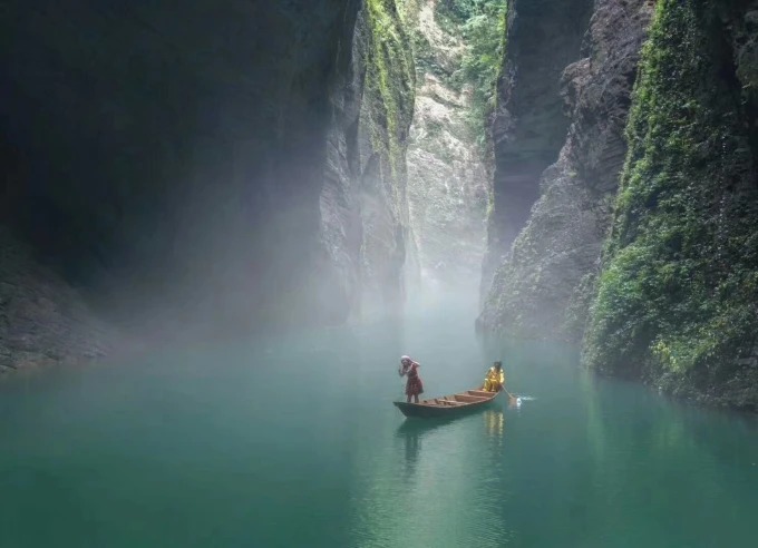 Forested slopes and water in Enshi