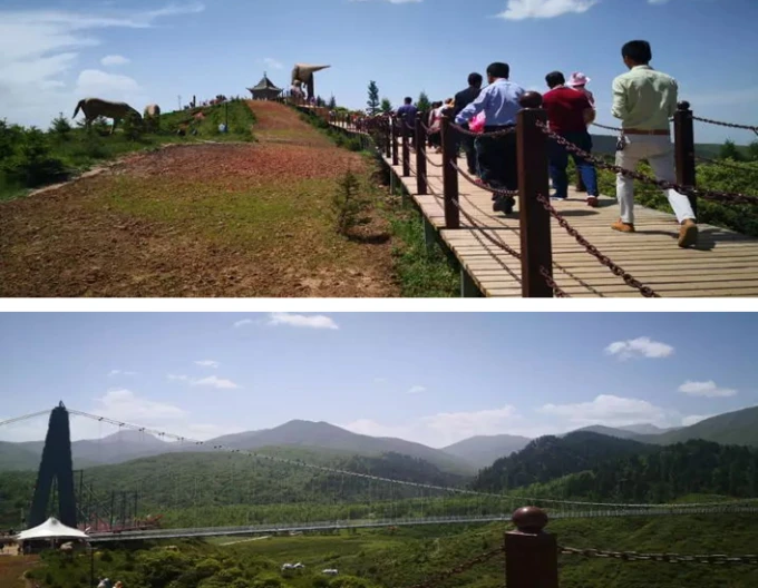 Grüne Hügel und Ackerland rund um den Fatai-Berg im Kreis Hezheng in Gansu