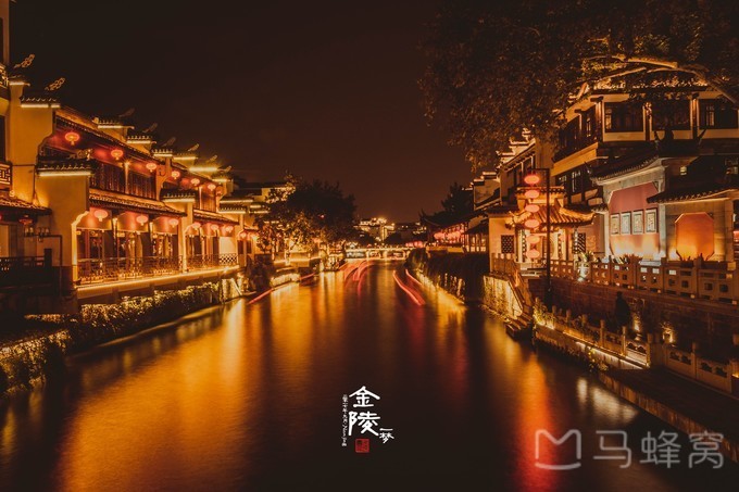 Qinhuai River at night with illuminated buildings along both banks