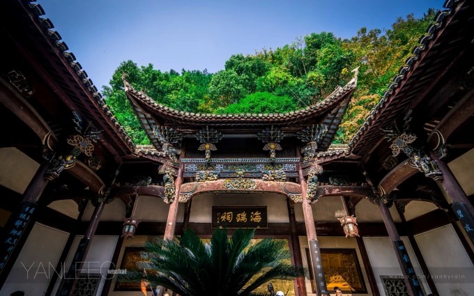 Traditional buildings among trees on Longshan Island