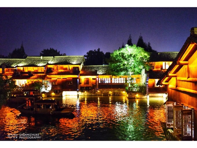Wuzhen canal illuminated at night