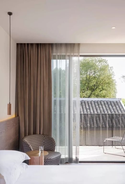 Gästezimmer mit Designermöbeln in Tanjia Qixiang