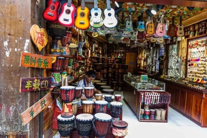 Instrument shop with drums and ukuleles in Xijiang