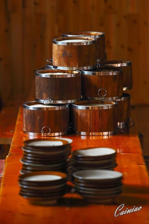 Pots and stacked plates prepared for dining in Xijiang